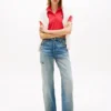 Polo Tommy Jeans dal taglio boxy e corto