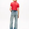 Polo Tommy Jeans dal taglio boxy e corto