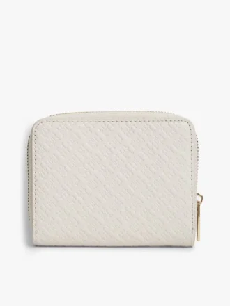 Portafoglio con zip e monogramma su tutta la superficie