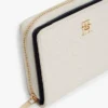 Portafoglio con zip e monogramma su tutta la superficie