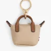Portamonete con monogramma e ciondolo per borsa Portamonete con monogramma e ciondolo per borsa