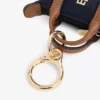 Portamonete con monogramma e ciondolo per borsa Portamonete con monogramma e ciondolo per borsa