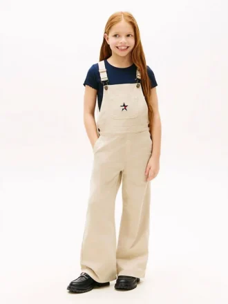 Salopette in denim elasticizzato a gamba larga per bambina