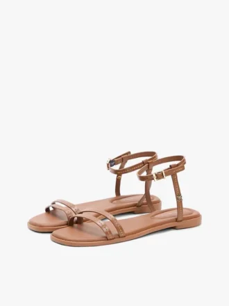 Sandalo piatto in pelle