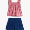 Set con top a quadretti e pantaloncini per neonati Set con top a quadretti e pantaloncini per neonati