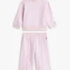 Set per neonati composto da top con stelle e pantaloni a gamba larga Set per neonati composto da top con stelle e pantaloni a gamba larga