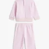 Set per neonati composto da top con stelle e pantaloni a gamba larga Set per neonati composto da top con stelle e pantaloni a gamba larga