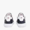 Sneaker con suola a cono in pelle a righe Sneaker con suola a cono in pelle a righe