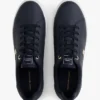 Sneaker da tennis in pelle con tacco e monogramma Sneaker da tennis in pelle con tacco e monogramma