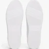 Sneaker da tennis in pelle con tacco e monogramma Sneaker da tennis in pelle con tacco e monogramma