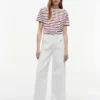T-shirt a righe con bottoni dorati T-shirt a righe con bottoni dorati