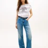 T-shirt a righe con logo ad arco e maniche a pipistrello T-shirt a righe con logo ad arco e maniche a pipistrello