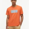 T-shirt con logo floreale tropicale T-shirt con logo floreale tropicale