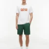 T-shirt con logo floreale tropicale T-shirt con logo floreale tropicale