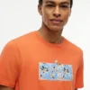 T-shirt con logo floreale tropicale T-shirt con logo floreale tropicale