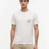 T-shirt con tasca e logo bandiera floreale T-shirt con tasca e logo bandiera floreale