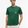 T-shirt con tasca e logo bandiera floreale T-shirt con tasca e logo bandiera floreale