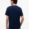 T-shirt con tasca e logo bandiera floreale T-shirt con tasca e logo bandiera floreale