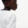 T-shirt da bambino con logo a strisce e bandiera