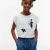 T-shirt da bambino con logo floreale in paillettes T-shirt da bambino con logo floreale in paillettes