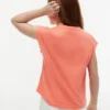 T-shirt da bambino con logo floreale in paillettes T-shirt da bambino con logo floreale in paillettes