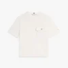 T-shirt dalla vestibilità comoda con tasca e bottone dorato T-shirt dalla vestibilità comoda con tasca e bottone dorato