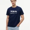 T-shirt Hilfiger con logo multi-bandiera T-shirt Hilfiger con logo multi-bandiera