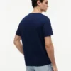 T-shirt Hilfiger con logo multi-bandiera T-shirt Hilfiger con logo multi-bandiera