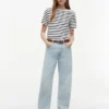 T-shirt in cotone interlock con bottoni dorati T-shirt in cotone interlock con bottoni dorati