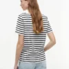 T-shirt in cotone interlock con bottoni dorati T-shirt in cotone interlock con bottoni dorati