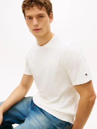 T-shirt in jacquard con logo bandiera su tutta la superficie