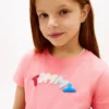T-shirt multicolore con logo in rilievo per bambini