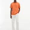 T-shirt tinta in capo con logo foglia d’alloro T-shirt tinta in capo con logo foglia d’alloro
