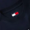 T-shirt Tommy Jeans con grande logo bandiera T-shirt Tommy Jeans con grande logo bandiera