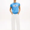 T-shirt Tommy Jeans con logo bandiera ondulata T-shirt Tommy Jeans con logo bandiera ondulata