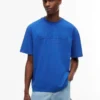 T-shirt Tommy Jeans con logo effetto consumato T-shirt Tommy Jeans con logo effetto consumato