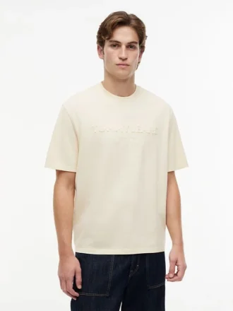 T-shirt Tommy Jeans con logo effetto consumato