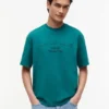 T-shirt Tommy Jeans con logo effetto consumato T-shirt Tommy Jeans con logo effetto consumato