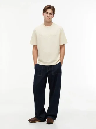 T-shirt Tommy Jeans con logo effetto consumato