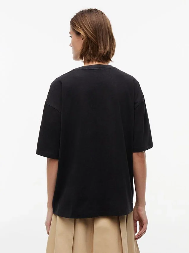 T-shirt Tommy Jeans con logo in cristallo T-shirt Tommy Jeans con logo in cristallo