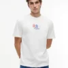 T-shirt Tommy Jeans con logo Multi-Crest T-shirt Tommy Jeans con logo Multi-Crest