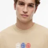 T-shirt Tommy Jeans con logo Multi-Crest T-shirt Tommy Jeans con logo Multi-Crest