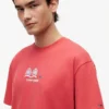 T-shirt Tommy Jeans con logo Multi-Crest T-shirt Tommy Jeans con logo Multi-Crest