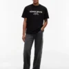 T-shirt Tommy Jeans con logo sfumato T-shirt Tommy Jeans con logo sfumato