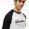 T-shirt Tommy x Cadillac F1® Team con maniche raglan T-shirt Tommy x Cadillac F1® Team con maniche raglan