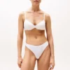 Tanga in cotone elasticizzato con logo ripetuto
