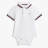 Tutina polo Tommy Wicking per neonati Tutina polo Tommy Wicking per neonati