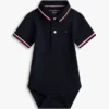 Tutina polo Tommy Wicking per neonati Tutina polo Tommy Wicking per neonati
