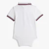 Tutina polo Tommy Wicking per neonati Tutina polo Tommy Wicking per neonati