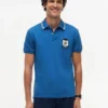 Vestibilità regolare Polo in piqué con stemma monogramma Vestibilità regolare Polo in piqué con stemma monogramma